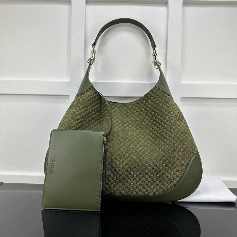 G*u*i top handle bags